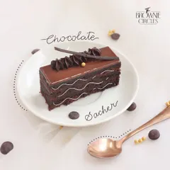 Our take on the Viennese classic, the Chocolate Sacher pastry. It has dense chocolate sponge layers with a hint of apricot, all coated in a glossy chocolate glaze.