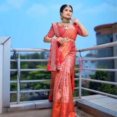 A full-length view of the traditional South Indian bridal look. I draped the rich Kanjeevaram saree and styled it with temple jewellery to create an authentic and regal appearance for the wedding ceremony.