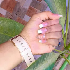 A beautiful baby boomer or French ombre nail set created by a student. This shows their skill in blending colors seamlessly and achieving a clean, elegant finish on long, square-shaped extensions.