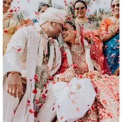 The moment it becomes real. Surrounded by loved ones and a shower of petals, their joy was so bright and infectious. This is the beautiful chaos I love to capture.