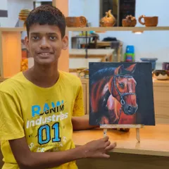 Sahil proudly presents his masterpiece. His dedication showcases the patience and passion we nurture in our advanced students, helping them create portfolio-worthy art.