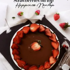 Strawberries on top, happiness nonstop. This cake features a smooth chocolate ganache base completely covered with a beautiful arrangement of fresh, sliced strawberries.
