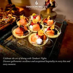 Celebrate the art of dining with us. These individual dessert glasses, featuring a creamy panna cotta with a rich berry coulis and edible flowers, showcase our commitment to gastronomic excellence.