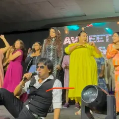 A fun moment where I'm down on the floor, singing directly to the guests who have joined me on stage.