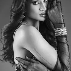 Sometimes, black and white says more than color ever could. This portrait of Shweta Sharda strips away everything but light, shadow, and emotion. The sheer gloves and intricate jewellery add texture, creating a timeless and powerful high-fashion image.