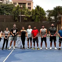 A snapshot of one of our adult group classes. These sessions are perfect for players who want to improve their game while enjoying a social and energetic workout.