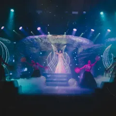 The bride's solo performance to open the Sangeet. We designed a celestial stage with cosmic backdrops and professional dancers to make her moment feel powerful and otherworldly.