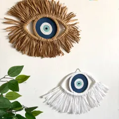 Here are two of my most popular Evil Eye designs, side-by-side. One is crafted with natural raffia for an earthy, rustic feel, while the other uses soft white cotton for a clean, modern look. Both are made to bring a sense of peace and protection to your space.