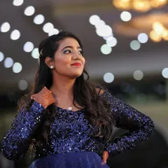 Reception glam is all about fun and sparkle. For this look, I focused on a shimmery eye and a bold lip to match her stunning sequined gown, creating a perfect modern makeup look for her evening celebration.