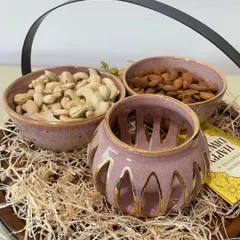 Each element in the Diwali hamper is handcrafted. The combination of the soft pink glaze and real gold makes these pieces feel truly special for the festival of lights.