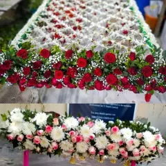 Here are two more real flower chadar options. The top design features a classic combination of red roses and white rajnigandha, while the bottom one uses white chrysanthemums and pink roses with hanging bells.