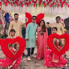 We provide creative props to make your entry unique. For this couple's entry, our dancers used large, feathered heart props to create a beautiful and romantic pathway.