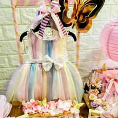 This baby closet hamper for Yaana is one of the cutest things I've made. The little rainbow dress is the star of this beautiful arrangement, perfect for a birth announcement.