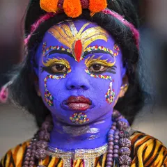 This powerful portrait of a child in traditional makeup for a cultural festival highlights the ability of our photographers to capture vibrant, expressive, and meaningful human moments.