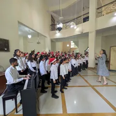 Our student choir fills the hall with festive cheer during one of our annual Christmas concerts. These events provide a wonderful opportunity for our vocal students to perform for family, friends, and the community.