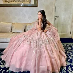This is what I call a full princess doll look. For her engagement, we chose a dreamy, romantic style with glowing skin and soft pink tones to match her magnificent floral gown.