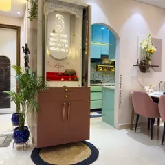 This unique rotating mandir is a perfect solution for saving space. It can be turned to face the living area or tucked away for a cleaner look.