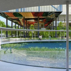 This view showcases the integration of art and nature at the Amara Raja campus. The colorful, large-scale artwork on the underside of the building is visible from the walkway, adding a layer of creative inspiration to the daily journey of the researchers and staff.