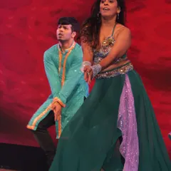 A moment of intense expression during a stage performance. I teach my students that dance is not just movement, but also storytelling and emoting.