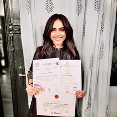 A proud and happy moment holding my Master Yoga Teacher certificates. This journey has been about so much more than poses; it's been about healing, growth, and finding the courage to move forward.