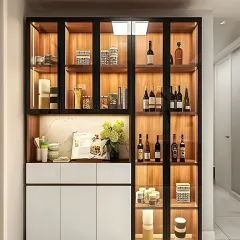 This crockery and bar cabinet is perfect for entertainers. It features glass doors with black metal frames, backlit wooden shelves for displaying bottles and glassware, and solid white cabinets below for concealed storage.