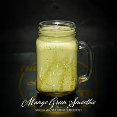 Get your greens in with our Mango Green Smoothie. This nutrient-dense beverage combines mango, banana, and spinach with almond milk and honey for a healthy and delicious boost.
