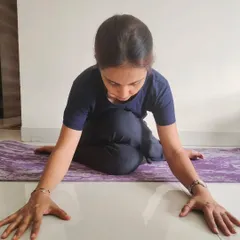 Yin yoga is a meditative practice that helps balance a dynamic 'Yang' lifestyle. This seated forward bend targets the deep connective tissues, improves flexibility, and calms the nervous system.