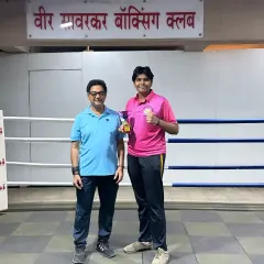 Posing with one of our champions after her victory at the "PINK POWER" girls and womens boxing tournament. Every win is a win for the entire club.
