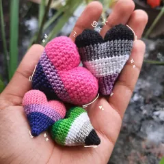 As a queer artist, making Pride art is so important to me. I can create these little hearts in any Pride flag colors, perfect as pins, keychains, or earrings to show off who you are.