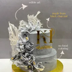 I believe a cake should be both beautiful and pure. This two-tiered edible art piece gets its unique grey hue from natural black charcoal, not artificial food coloring, proving that indulgence never has to compromise on quality.