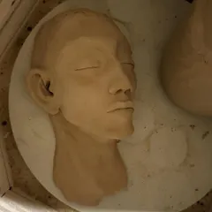 The sculpture is now ready for its first firing in the kiln. This bisque firing will turn the fragile clay into a hard, porous ceramic piece.