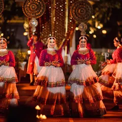 I arrange for captivating entertainment that matches your wedding's theme. Here, traditionally dressed dancers welcome guests with a graceful performance, adding a touch of Rajasthani culture and elegance to the Sangeet night.