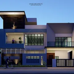 The facade of the Arun Reddy residence in Hosur, designed on a corner plot. The concept plays with solid and void masses, using angular inclined walls to create a unique, contemporary look that is also fully Vastu-compliant.