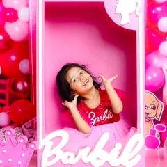 A real-life Barbie doll. This fun and vibrant Barbie-themed shoot lets your child step into a world of pink, sparkle, and imagination.