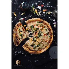 A dynamic overhead shot of a pizza, styled with scattered ingredients for an editorial feel. This dark, moody photography is perfect for restaurants wanting to create a premium, artisanal brand image.