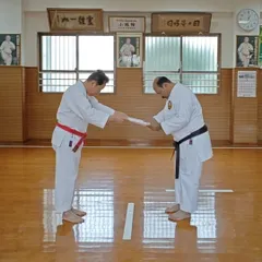 The authenticity of our teaching comes directly from Okinawa, the birthplace of karate. It was a moment of great honor to receive my Kyoshi Nanadan (7th Dan) rank from my teacher, Hanshi Minoru Nakazato, at the Shorin-ryu Shorinkan Honbu Dojo in Japan. This connection ensures that every student here learns the true art.
