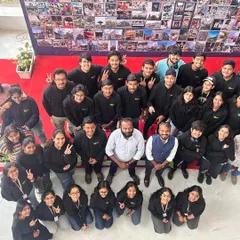 This photo captures the incredible energy after a mascot design session with students from Dr. DY Patil University's School of Design. Creating a positive and collaborative atmosphere is key to my workshops.