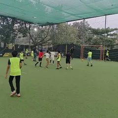 A wide view of a football party in full swing on a professional turf. We manage the game flow to keep everyone engaged.