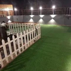 An artificial lawn from me means you get a perfect green space 24/7. This terrace installation looks just as lush and inviting at night, making it the ideal spot for enjoying cool evenings outdoors without the mud or mess of real grass.
