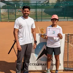Sara Hooda with her coach after winning her first singles title in the Under 16 Girls category at the AITA Champion Series tournament in Gurgaon. She was also the doubles runner up.
