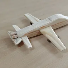 A close-up of a wooden airplane, a classic toy that is always a joy to make. This project is great for learning shaping and assembly techniques.