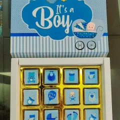 A sweet and simple way to share your joy. This 'It's a Boy' box contains my handmade chocolates with adorable custom-printed wrappers, making for a perfect and affordable baby announcement gift.