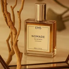 This frame for Nomade Eau de Parfum was crafted to echo its rustic soul. I used warm tones, raw wood textures, and a mirror to create a sense of earthy, understated elegance that lets the fragrance speak.