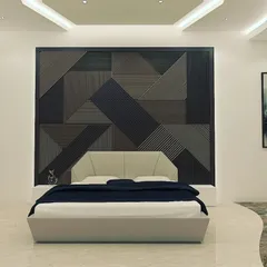 A 3D render of a contemporary bedroom design. The focus here is on creating a serene and sophisticated atmosphere through a geometric feature wall, minimalist furniture, and carefully planned ambient and accent lighting, showing our attention to detail in private living spaces.