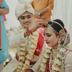 The groom applies sindoor to the bride's forehead, one of the most significant rituals in a Hindu wedding. I capture these moments with reverence and care.