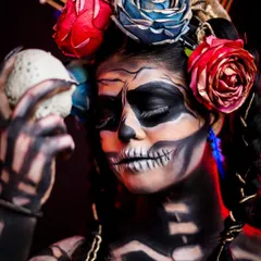 A close-up on the intricate details of the skull makeup. You'll learn to use fine brushes and specialized paints to achieve this level of realism and artistry.