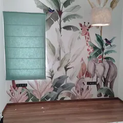 Another look at the jungle-themed kid's room where I installed a fabric Roman blind. My service includes helping you pick a blind style that works with your overall interior design.