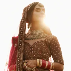 A bride bathed in the golden light of the sun, a moment of quiet reflection before she steps into her new life. My bridal portraiture is about capturing this inner radiance and timeless elegance.