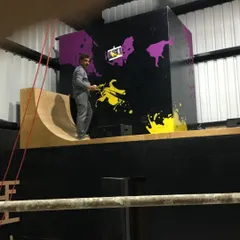 Our artist working on a large-scale graphic mural for a commercial space. We have the equipment and experience to handle large and complex projects for businesses in Bengaluru.