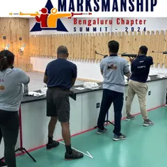 Shooters take their positions during the Open Sight Rifle competition at the Marksmanship Summit. The event brings together athletes to compete in a professional and supportive environment.